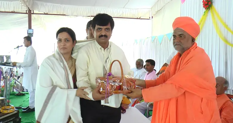 A Swamiji being received and felicitated at a programme of the Trust