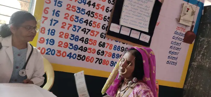 The screening team at work in a settlement of Shahapur taluk